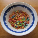 Photograph of a small amount of Fruity Pebbles in a typical bowl.