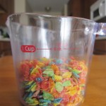 Photograph of Fruity Pebbles in a small measuring cup.