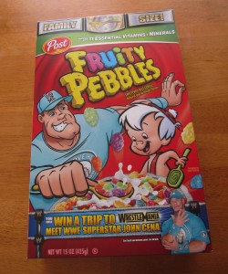 A photograph of a family size box of Fruity Pebbles